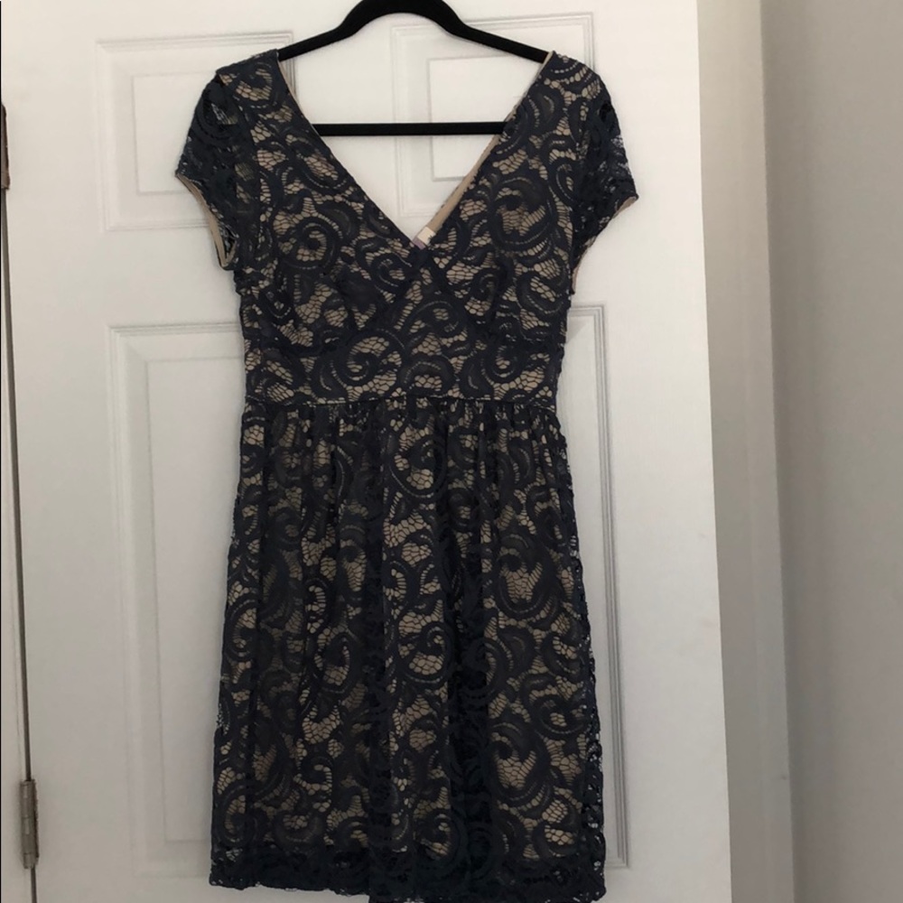 Navy blue lace dress with nude underlay